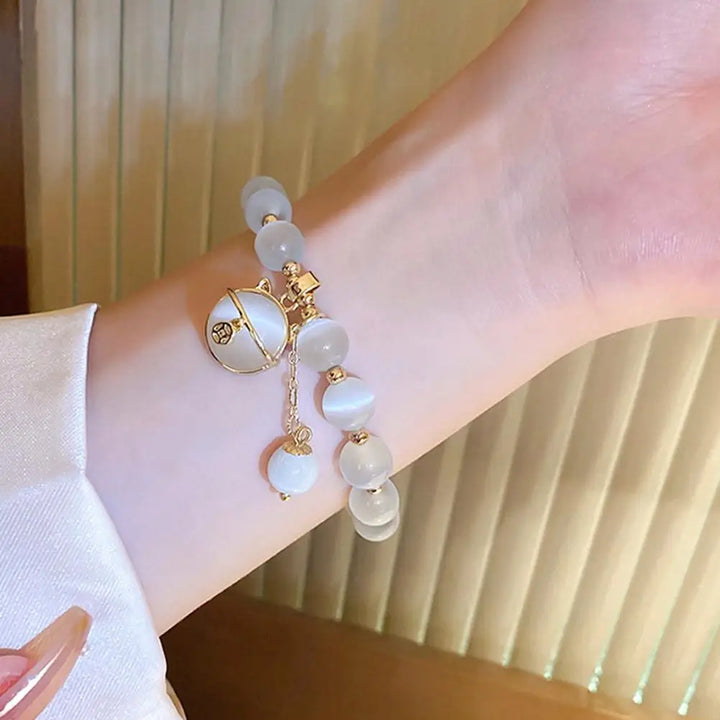 Perlenarmband mit Glückskatze Anhänger
