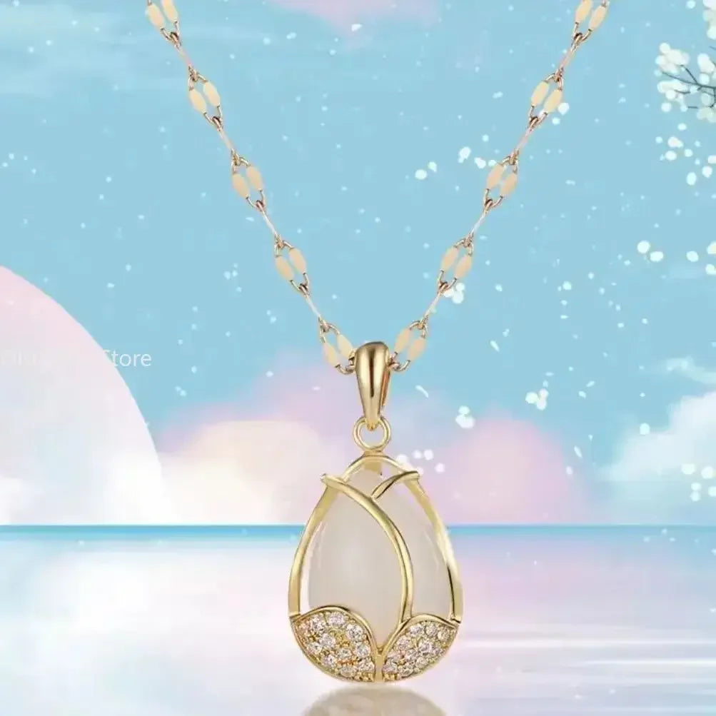 Elegante Goldene Tulpen Halskette mit Pinkem Kristall Anhänger
